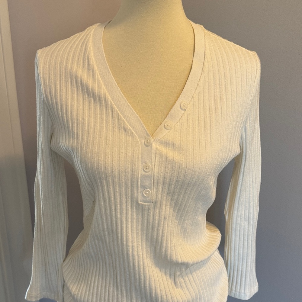 Liverpool whitish ribbed v-neck Henley style sweater.